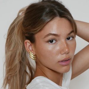 Heaven mayhem wing gold earrings